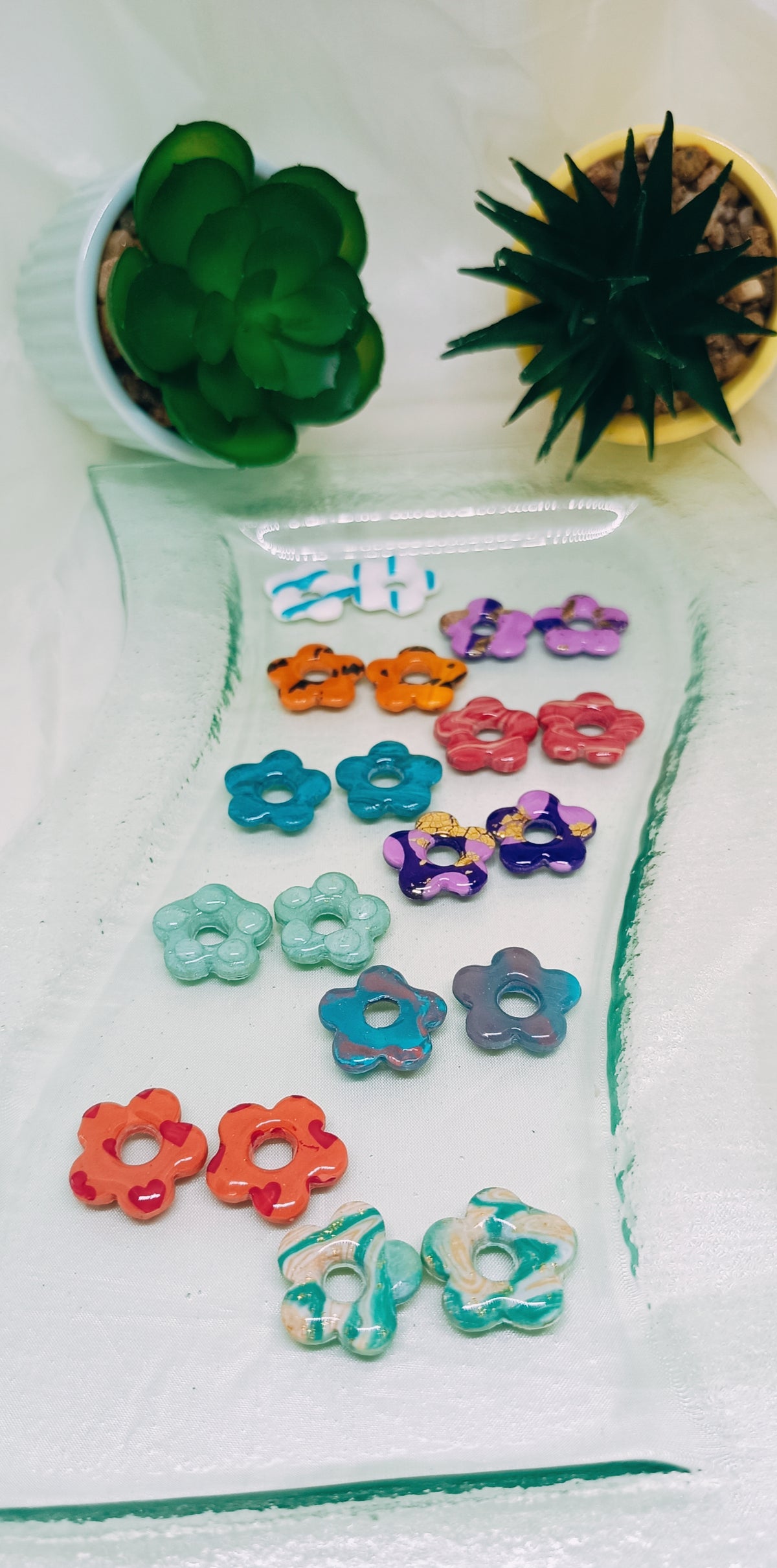 Pampilles interchangeables Doucéas de divers coloris : turquoise marbré rose, orange coucher de soleil, style marinière bleu et blanc, violet doré et relief bulles - SoizElla